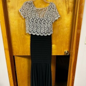 Size 4, mermaid style formal dress, with beautiful lace detail.